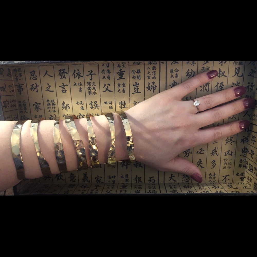 Pair of gold, hammered, full forearm cuffs